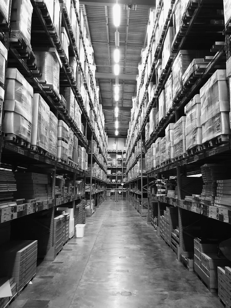 Rows of shelves in a large warehouse